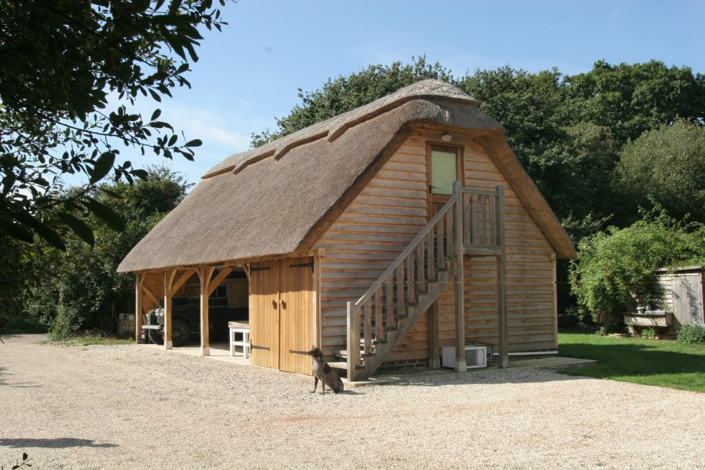 four bay garage with room above